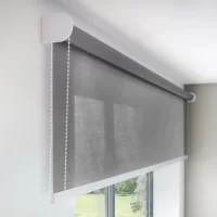 Grey Roller Blinds mounted on Window